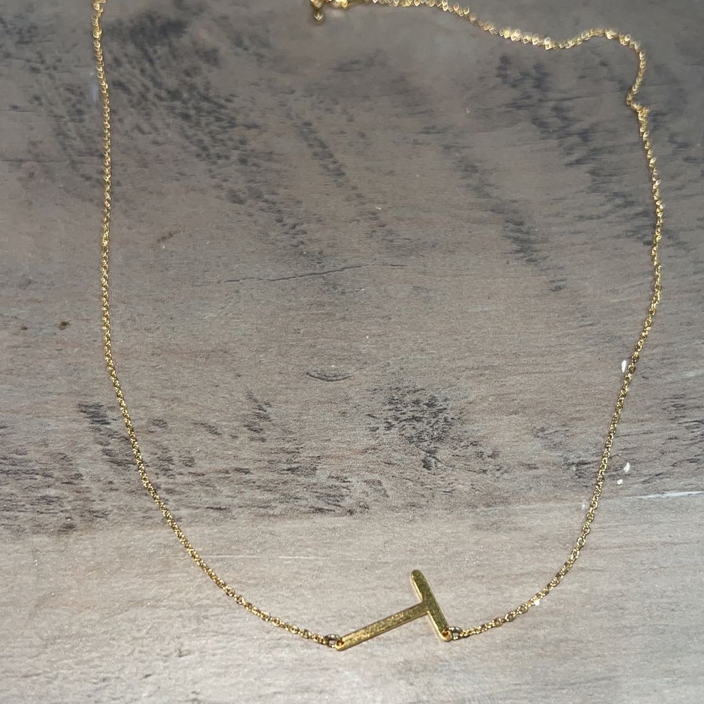 Gold “T” necklace